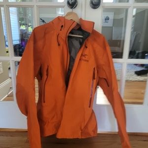Arc'teryx gore Tex shell jacket.  Orange color. Excellent condition.